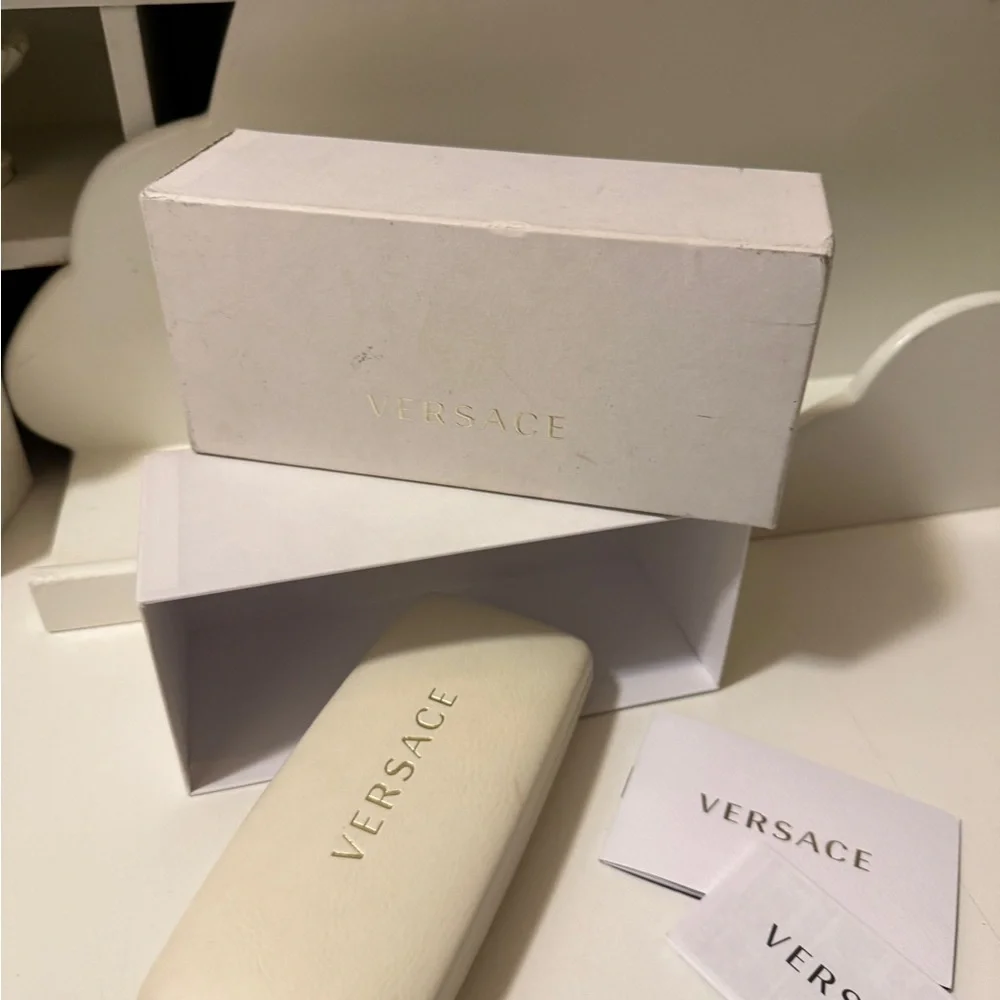 Two original Versace sunglasses case with new conditions